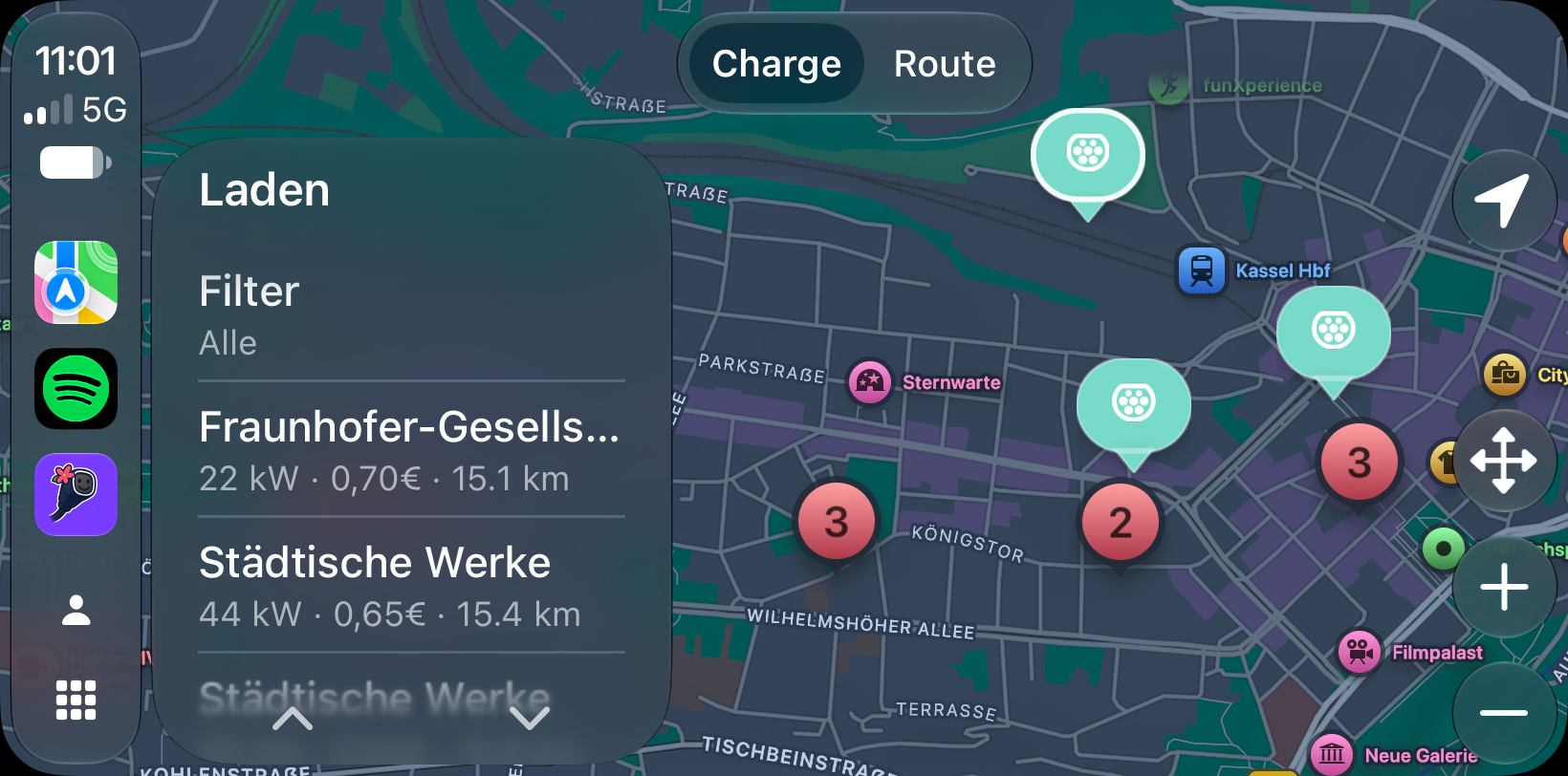 Charge a Smile CarPlay screenshot showing nearby chargers, prices, distances, and map pins around Kassel